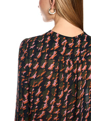 Bluse mit abstraktem Hahnentrittmuster