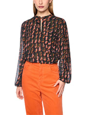 Bluse mit abstraktem Hahnentrittmuster