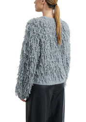 Strickpullover mit Fransen